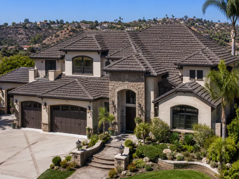 Mediterranean-style residential tile roof installed by Method Roofing Group on a Southern California luxury home