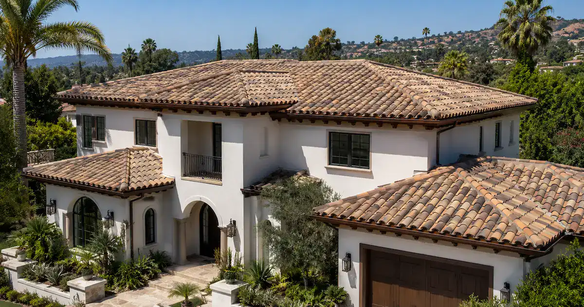 Southern California luxury Mediterranean-style home with a concrete tile roof installed by Method Roofing Group 