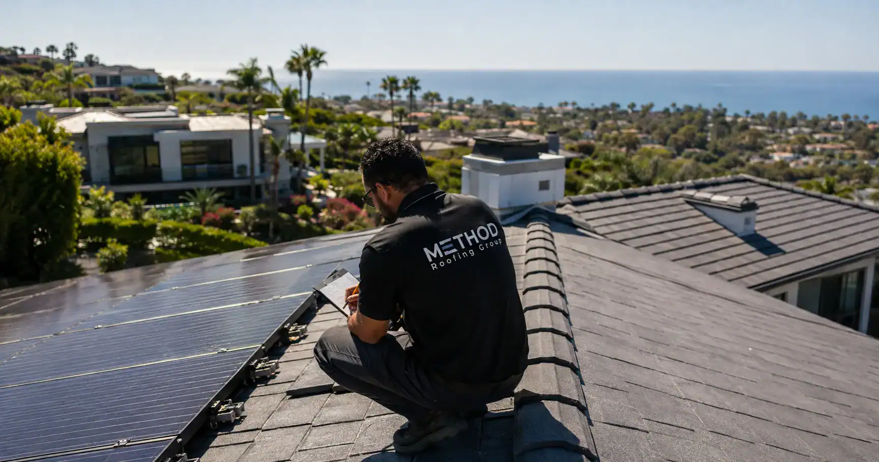 Roof inspection for a roof replacement with solar panels underway on a Southern California home